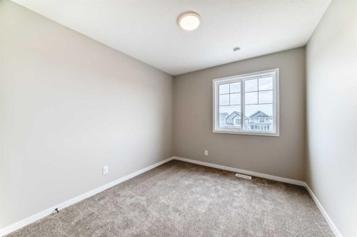 23 Magnolia Street Se, Calgary, AB - Indoor Photo Showing Other Room