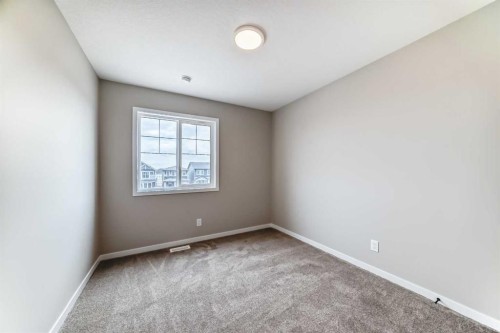 23 Magnolia Street Se, Calgary, AB - Indoor Photo Showing Other Room