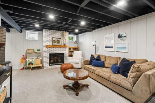 419 40 Street Sw, Calgary, AB - Indoor Photo Showing Other Room With Fireplace