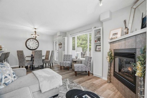 88 Chaparral Ridge Terrace Se, Calgary, AB - Indoor Photo Showing Living Room With Fireplace