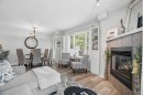 88 Chaparral Ridge Terrace Se, Calgary, AB  - Indoor Photo Showing Living Room With Fireplace 