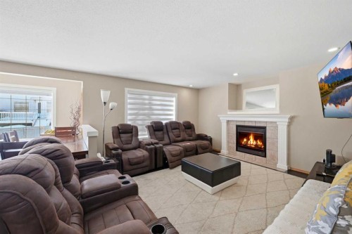 46 Panorama Hills Close Nw, Calgary, AB - Indoor Photo Showing Living Room With Fireplace