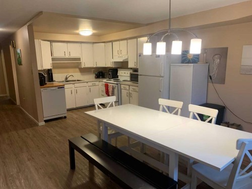 622 54 Avenue Sw, Calgary, AB - Indoor Photo Showing Kitchen With Double Sink
