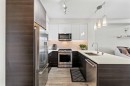 3404-95 Burma Star Road Sw, Calgary, AB  - Indoor Photo Showing Kitchen With Stainless Steel Kitchen With Double Sink With Upgraded Kitchen 