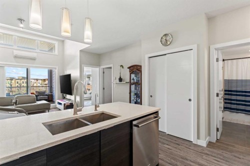 3404-95 Burma Star Road Sw, Calgary, AB - Indoor Photo Showing Kitchen With Double Sink