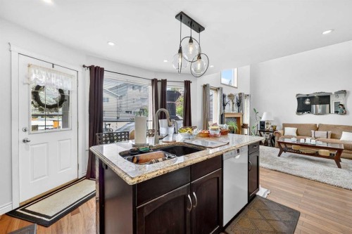 192 Arbour Wood Close Nw, Calgary, AB - Indoor Photo Showing Kitchen With Double Sink