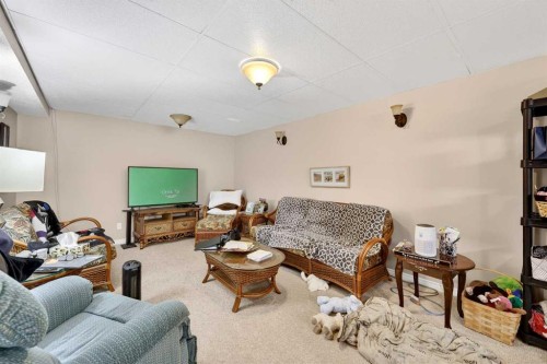 192 Arbour Wood Close Nw, Calgary, AB - Indoor Photo Showing Living Room