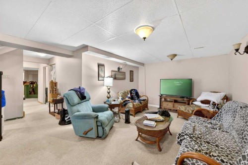 192 Arbour Wood Close Nw, Calgary, AB - Indoor Photo Showing Living Room