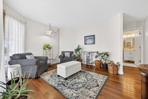 192 Arbour Wood Close Nw, Calgary, AB - Indoor Photo Showing Living Room