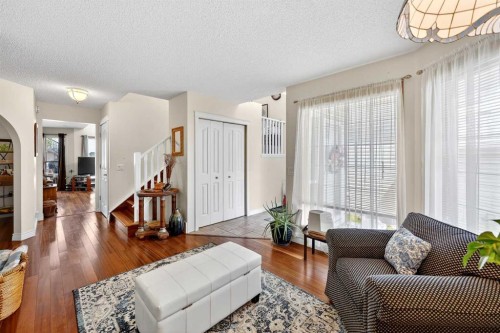 192 Arbour Wood Close Nw, Calgary, AB - Indoor Photo Showing Living Room