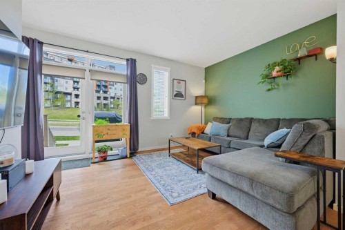 39 Kinlea Common Nw, Calgary, AB - Indoor Photo Showing Living Room