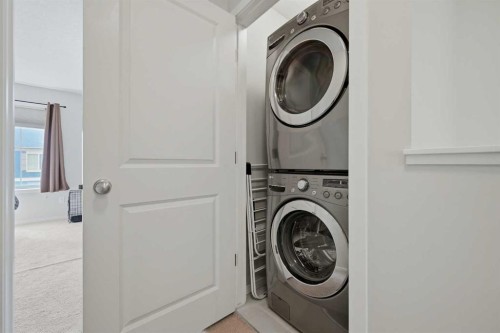 39 Kinlea Common Nw, Calgary, AB - Indoor Photo Showing Laundry Room