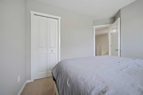 39 Kinlea Common Nw, Calgary, AB - Indoor Photo Showing Bedroom