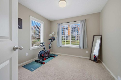 39 Kinlea Common Nw, Calgary, AB - Indoor Photo Showing Gym Room