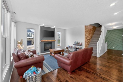 158 Masters Point Se, Calgary, AB - Indoor Photo Showing Living Room With Fireplace