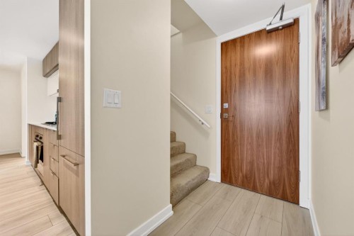 47 Waterfront Mews Sw, Calgary, AB - Indoor Photo Showing Other Room