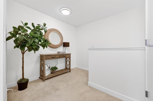 47 Waterfront Mews Sw, Calgary, AB - Indoor Photo Showing Other Room