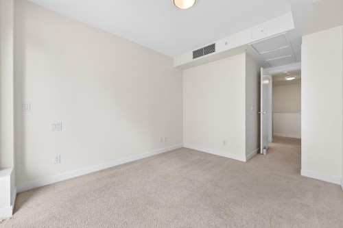 47 Waterfront Mews Sw, Calgary, AB - Indoor Photo Showing Other Room