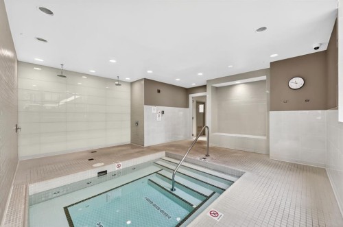 47 Waterfront Mews Sw, Calgary, AB - Indoor Photo Showing Other Room