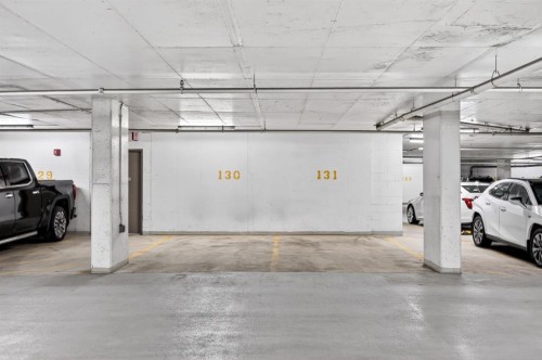 47 Waterfront Mews Sw, Calgary, AB - Indoor Photo Showing Garage