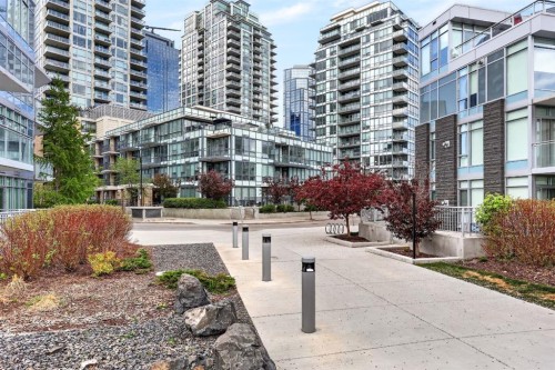 47 Waterfront Mews Sw, Calgary, AB - Outdoor With Balcony With Facade