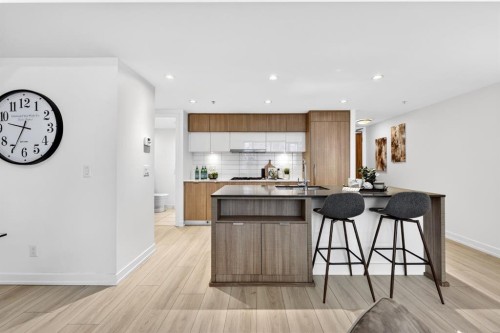 47 Waterfront Mews Sw, Calgary, AB - Indoor Photo Showing Kitchen With Upgraded Kitchen