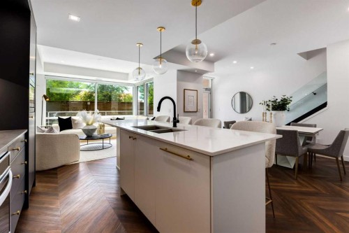 104-8445 Broadcast Avenue Sw, Calgary, AB - Indoor Photo Showing Kitchen With Double Sink With Upgraded Kitchen