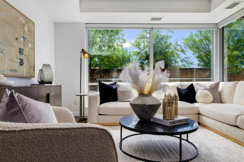 104-8445 Broadcast Avenue Sw, Calgary, AB - Indoor Photo Showing Living Room