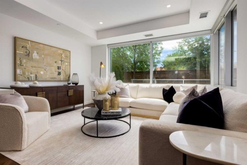 104-8445 Broadcast Avenue Sw, Calgary, AB - Indoor Photo Showing Living Room