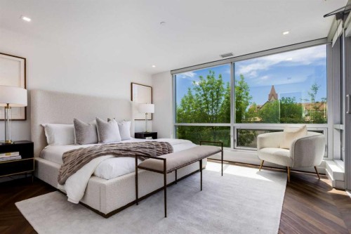 104-8445 Broadcast Avenue Sw, Calgary, AB - Indoor Photo Showing Bedroom