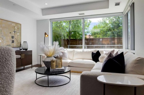 104-8445 Broadcast Avenue Sw, Calgary, AB - Indoor Photo Showing Living Room