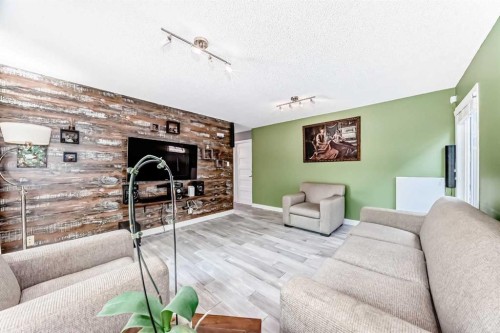 10412 Willowcrest Road Se, Calgary, AB - Indoor Photo Showing Other Room With Fireplace