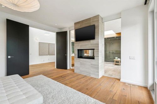 739 33A Street Nw, Calgary, AB - Indoor With Fireplace