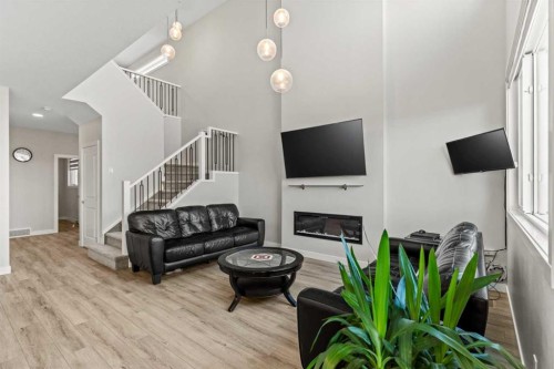283 Belvedere Drive Se, Calgary, AB - Indoor With Fireplace