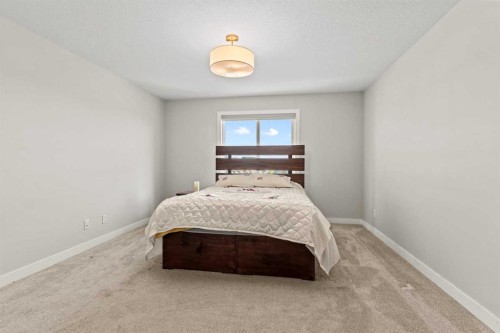 283 Belvedere Drive Se, Calgary, AB - Indoor Photo Showing Bedroom