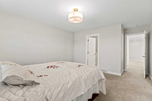283 Belvedere Drive Se, Calgary, AB - Indoor Photo Showing Bedroom