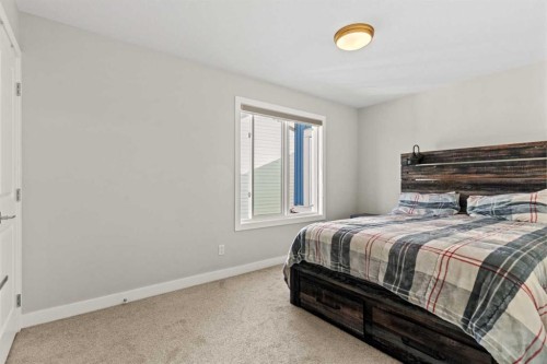 283 Belvedere Drive Se, Calgary, AB - Indoor Photo Showing Bedroom