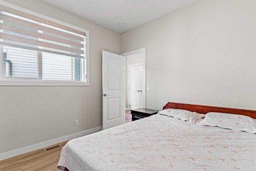 283 Belvedere Drive Se, Calgary, AB - Indoor Photo Showing Bedroom