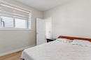 283 Belvedere Drive Se, Calgary, AB  - Indoor Photo Showing Bedroom 