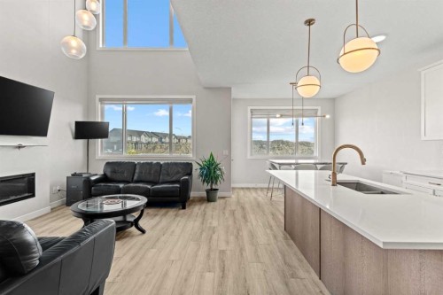 283 Belvedere Drive Se, Calgary, AB - Indoor With Fireplace