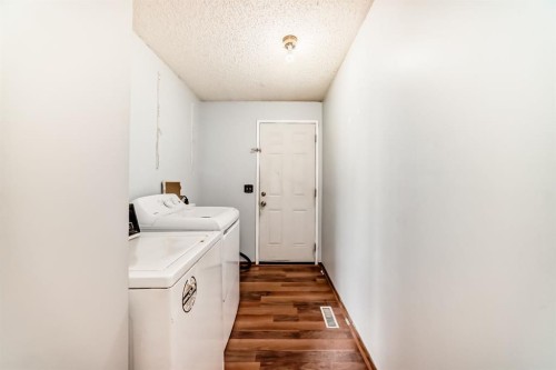 411 Abadan Place Ne, Calgary, AB - Indoor Photo Showing Laundry Room