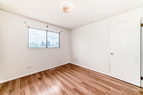 411 Abadan Place Ne, Calgary, AB - Indoor Photo Showing Other Room