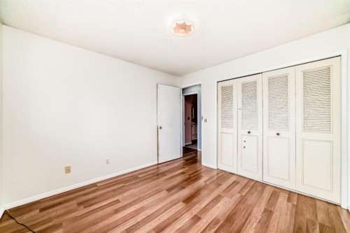 411 Abadan Place Ne, Calgary, AB - Indoor Photo Showing Other Room