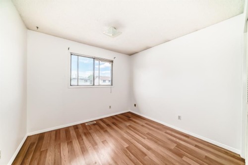 411 Abadan Place Ne, Calgary, AB - Indoor Photo Showing Other Room