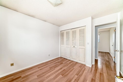 411 Abadan Place Ne, Calgary, AB - Indoor Photo Showing Other Room