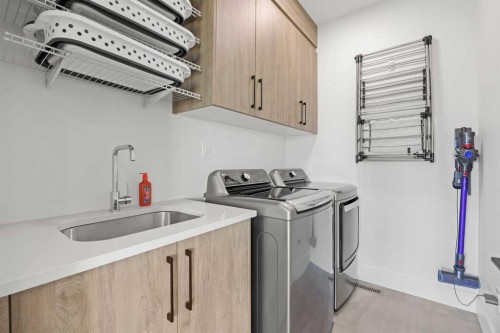127 Kinniburgh Crescent, Chestermere, AB - Indoor Photo Showing Laundry Room