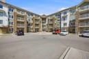 1408-6118 80 Avenue Ne, Calgary, AB  - Outdoor With Balcony With Facade 