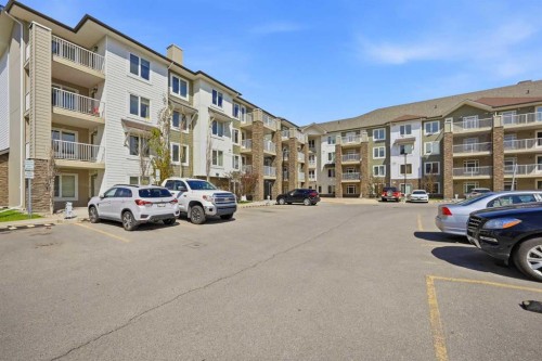 1408-6118 80 Avenue Ne, Calgary, AB - Outdoor With Balcony With Facade