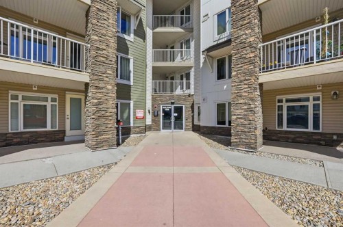 1408-6118 80 Avenue Ne, Calgary, AB - Outdoor With Balcony With Facade