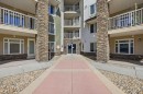 1408-6118 80 Avenue Ne, Calgary, AB  - Outdoor With Balcony With Facade 